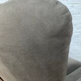 Swivel armchair in velvet fabric and metal