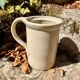 Ceramic pot with handle