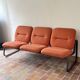 Strafor 3-seater bench, orange upholstery and sled base, 1970s.