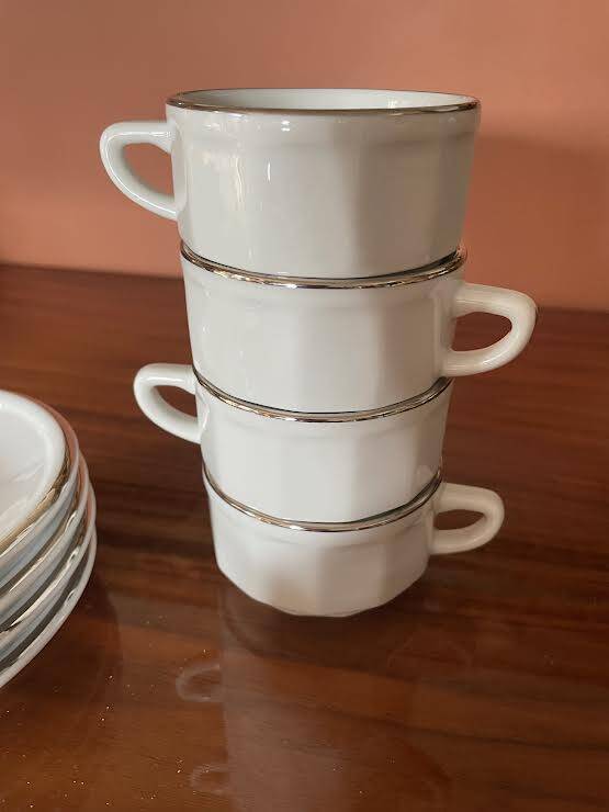 Four porcelain "bistro" cups and saucers