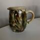 Glazed earthenware jug mixed clays Provence 1960