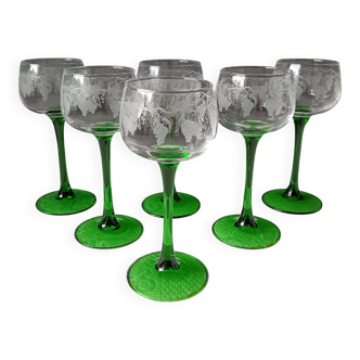 Emerald green stemmed white wine glasses, vine pattern.