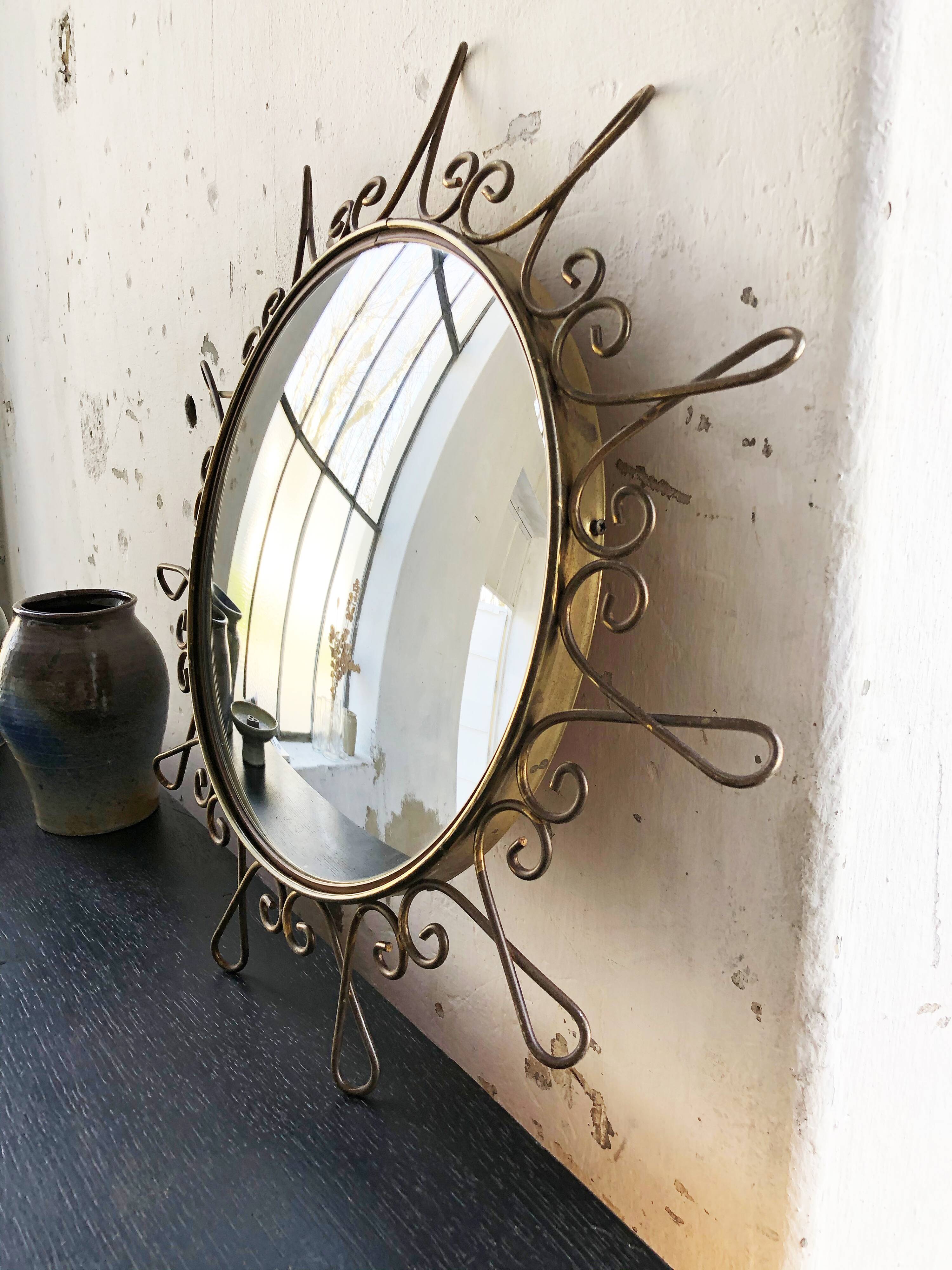 Brass witch mirror