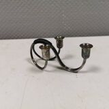 Small candle holder in tarnished silver, with place for three small candles