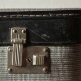 Old cardboard suitcase with its two keys
