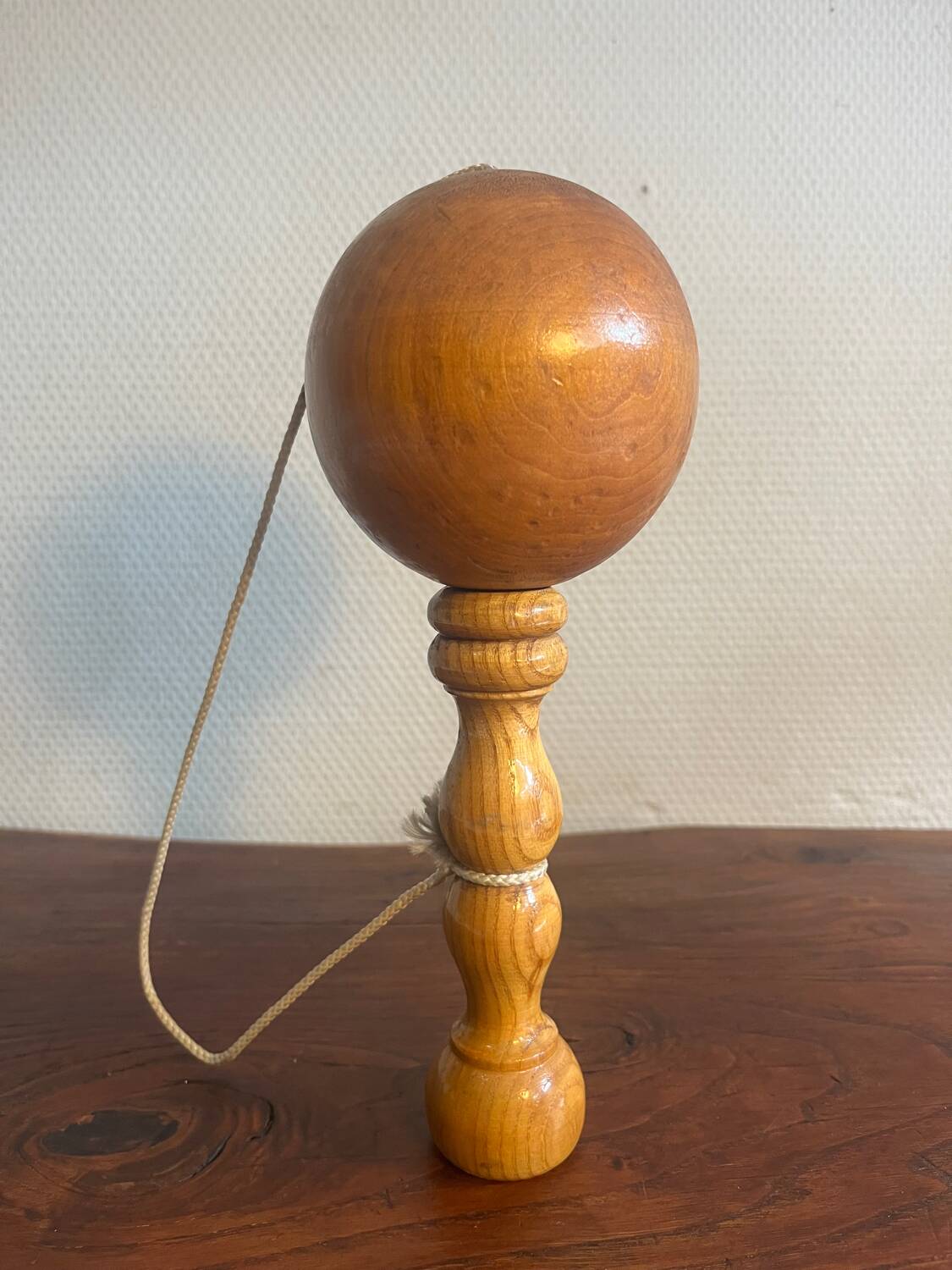 Wooden cup and ball game
