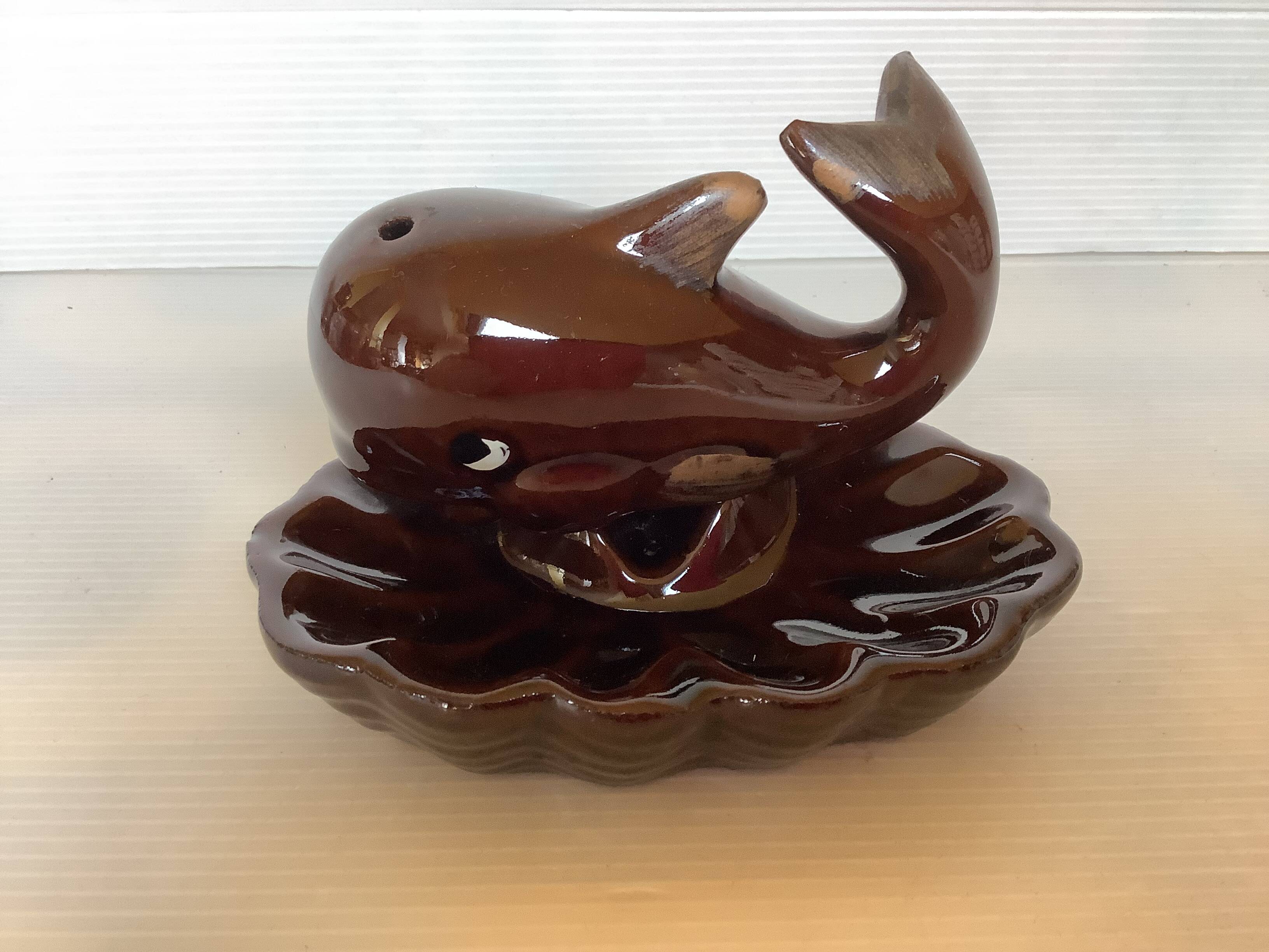 Whale-shaped pocket ashtray