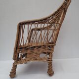 child's or doll's armchair in light woven wicker