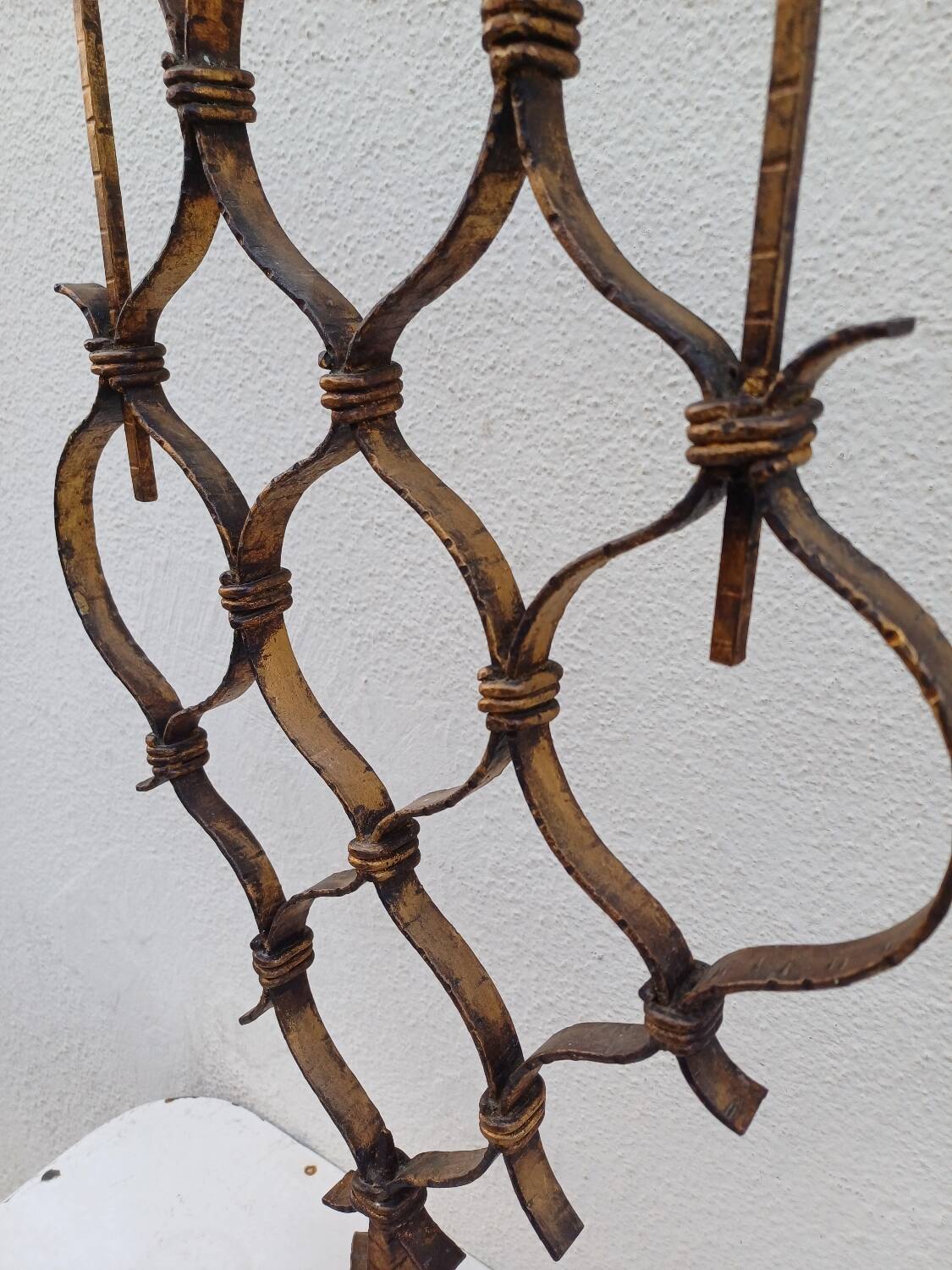 Large hammered wrought iron table candlesticks, gilded, 1950s, 60s