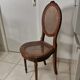 Antique chair Louis XVI style, seat caned, carved wood