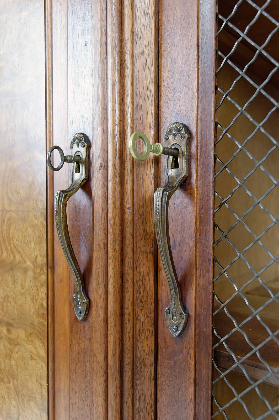 Art Deco showcase bookcase in carved walnut, France, circa 1925