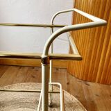 Dessert table with a cream-coloured metal structure and golden brass, 1960s.