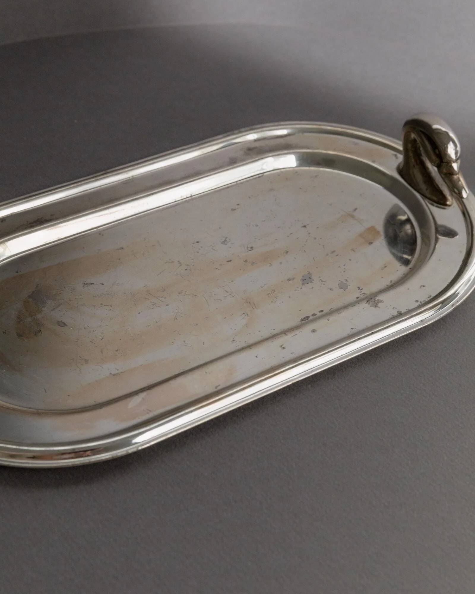 1960s vintage silver-plated oval tray with swan head handles.