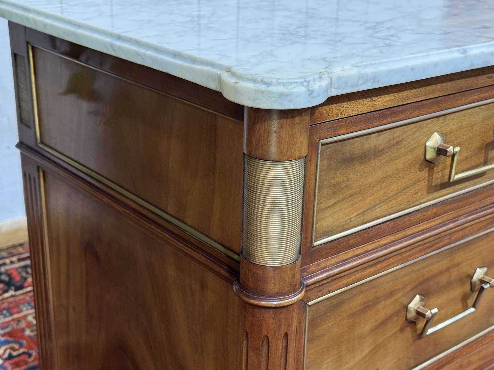Louis XVI commode in mahogany with a marble top from the 1950s.