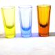 Set of 5 Art Deco 1920s shooter glasses in coloured and uranium glass - ouraline.