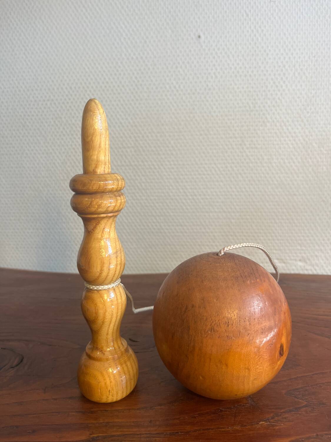 Wooden cup and ball game