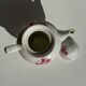 Complete porcelain teapot and warmer with pink floral decoration H18