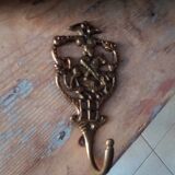 Old brass patère coat rack