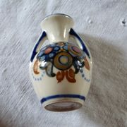 Vase double anses à motifs fleurs signé Alphonse Mouton