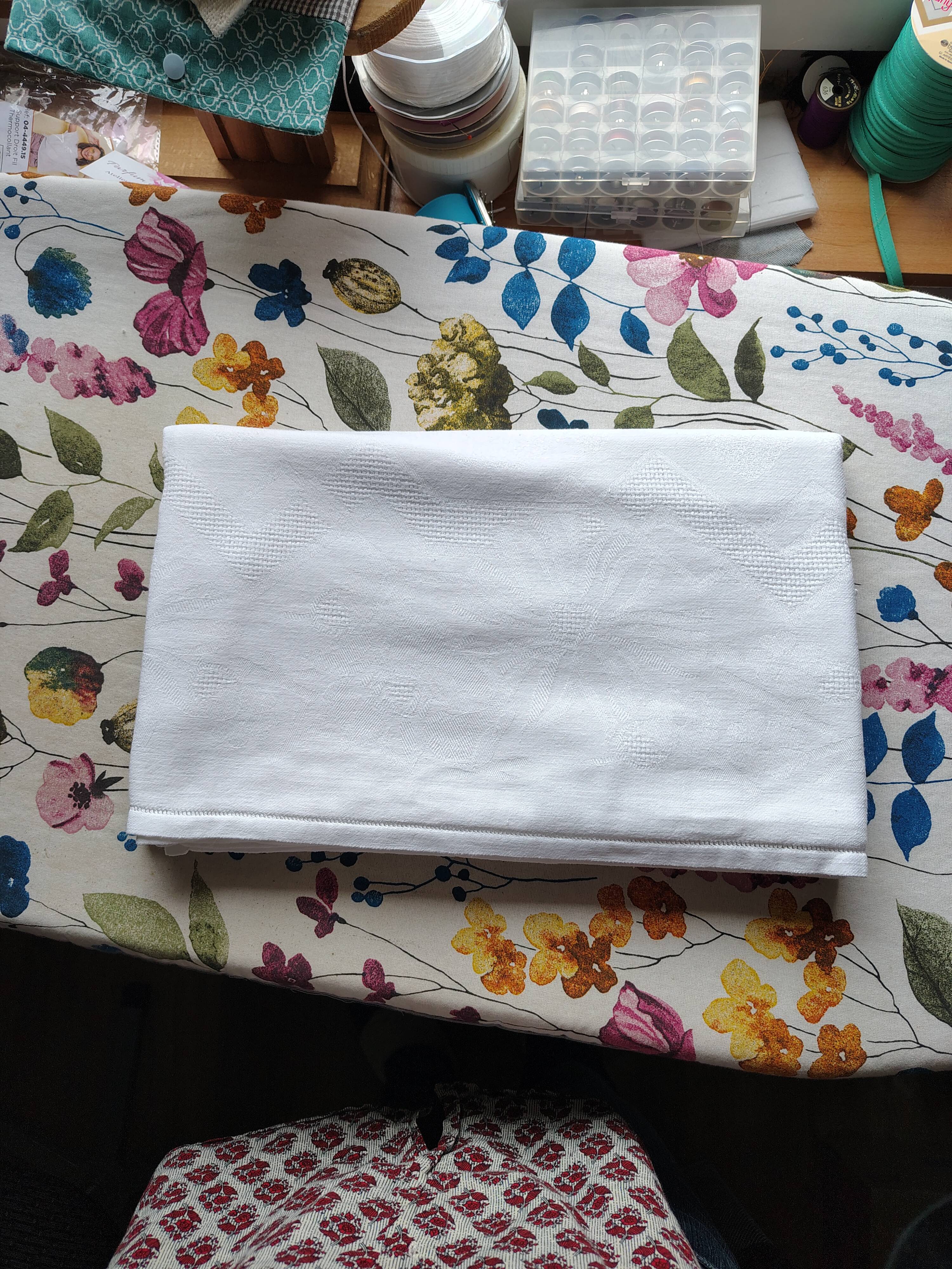 Old white damask cotton tablecloth