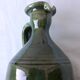 Glazed terracotta jug
