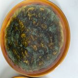 Set of 4 flamed enamel plates in green and amber from the 60s-70s.