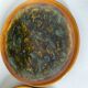 Set of 4 flamed enamel plates in green and amber from the 60s-70s.