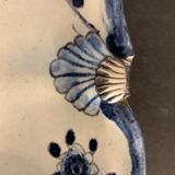 Old dish mounted in ceramic, scallop