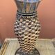 Wicker and metal vase