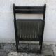 Black wooden folding chair