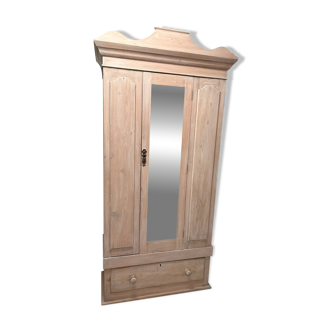 Antique English wardrobe in pale pink patina.