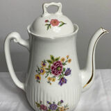 Antique porcelain teapot and sugar bowl