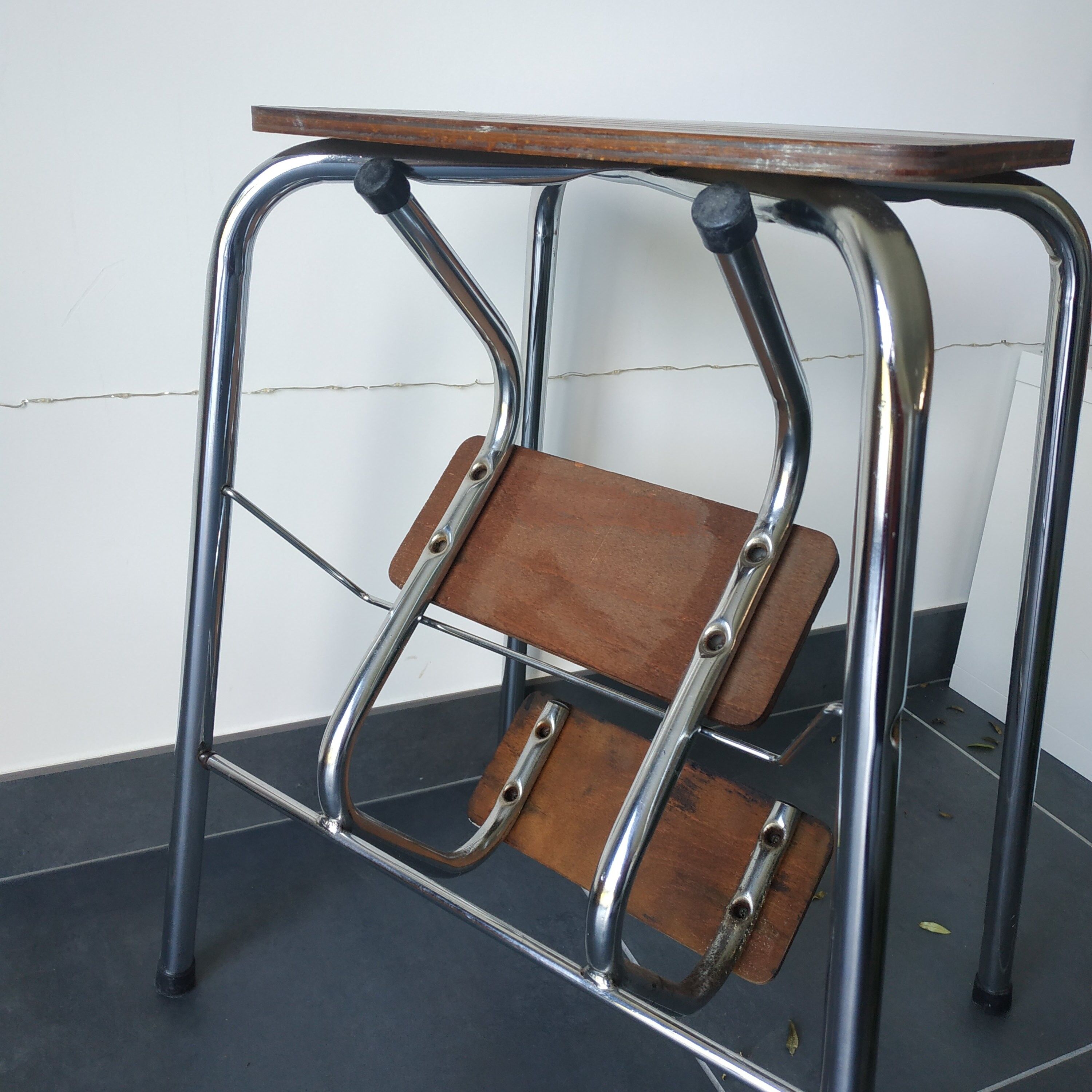 Old retractable wooden stepladder