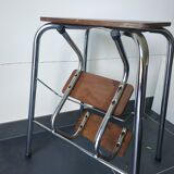 Old retractable wooden stepladder