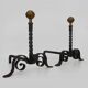 Large pair of wrought iron and brass ball fireplace andirons. 19th century