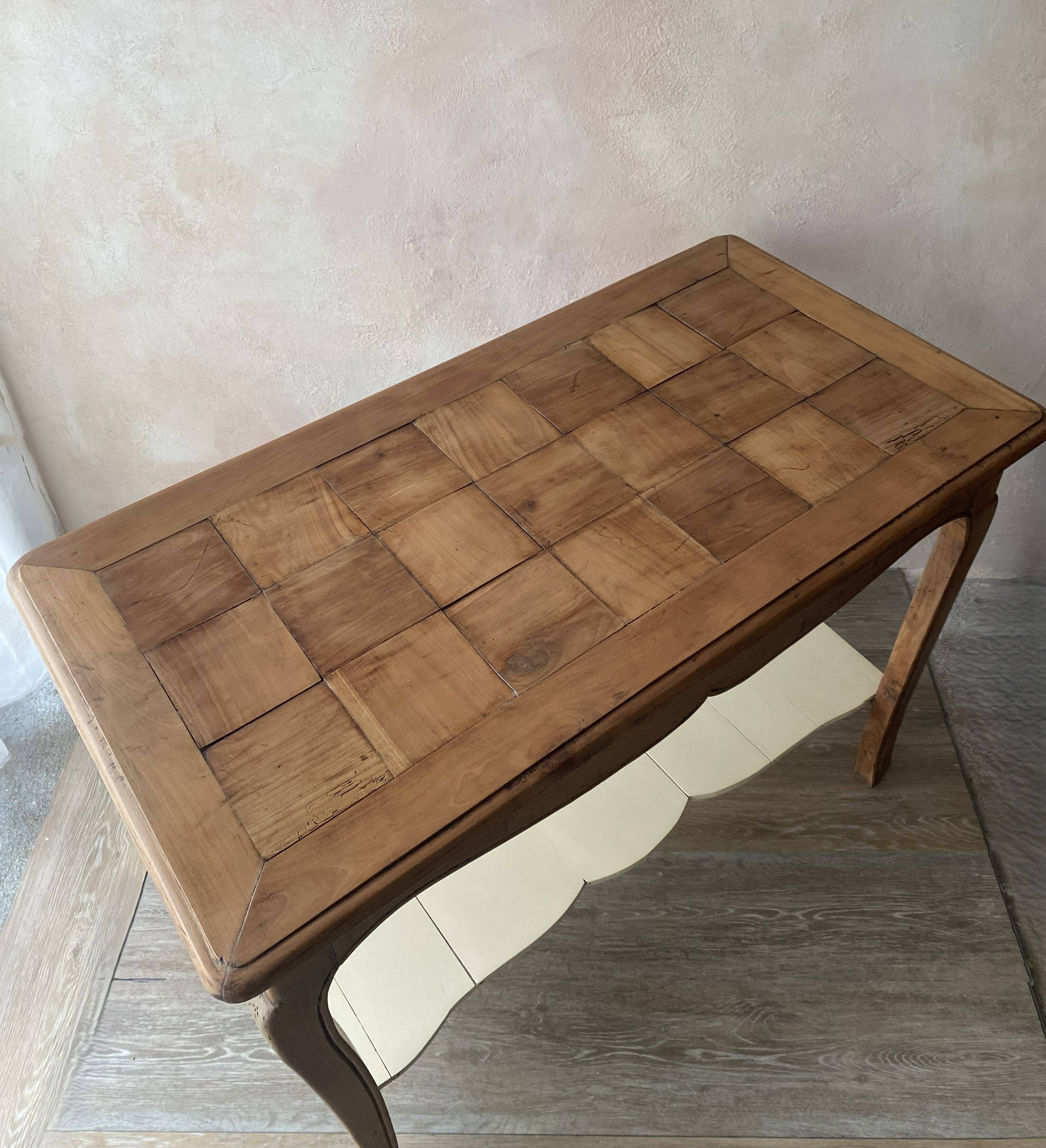 Antique console in solid cherry wood in Louis XV style.