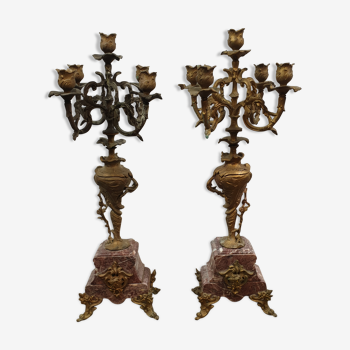 Pair of pink marble foot candlesticks