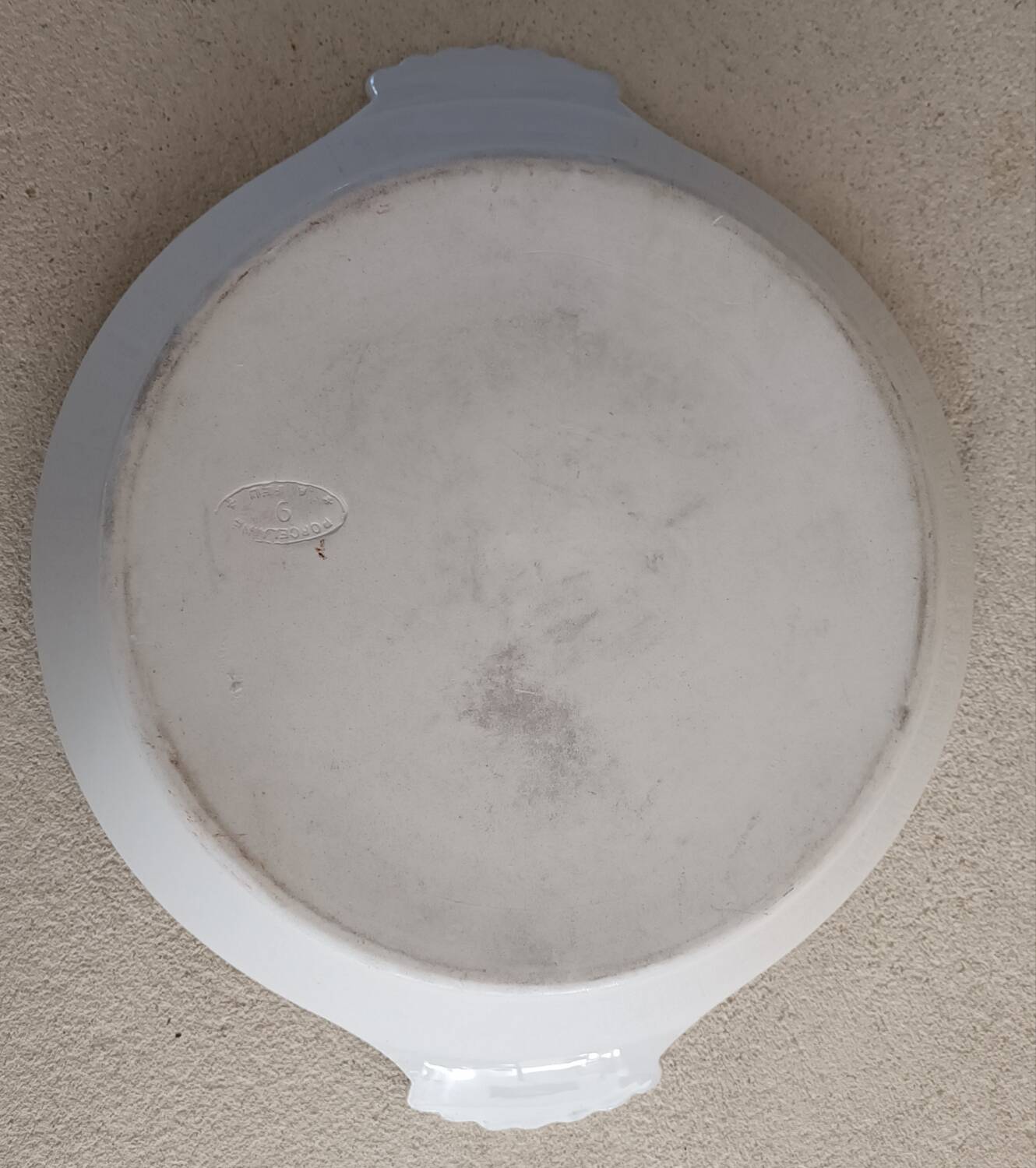 Porcelain fire dish
