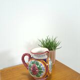 Porseleinen vintage roze kan met bloemen