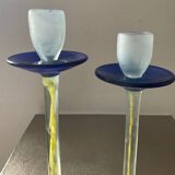 Duo of vintage Kosta Boda candlesticks in glass paste