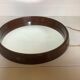 Vintage brown plastic round mirror