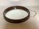 Vintage brown plastic round mirror