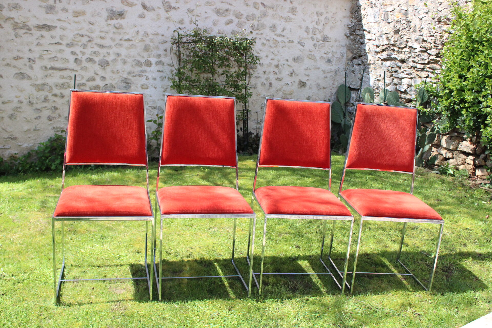 4 Chrome chairs in vintage orange velvet