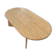 Oval coffee table in raw travertine
