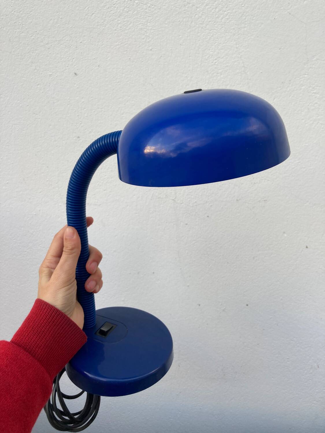 Articulated blue metal bedside lamp