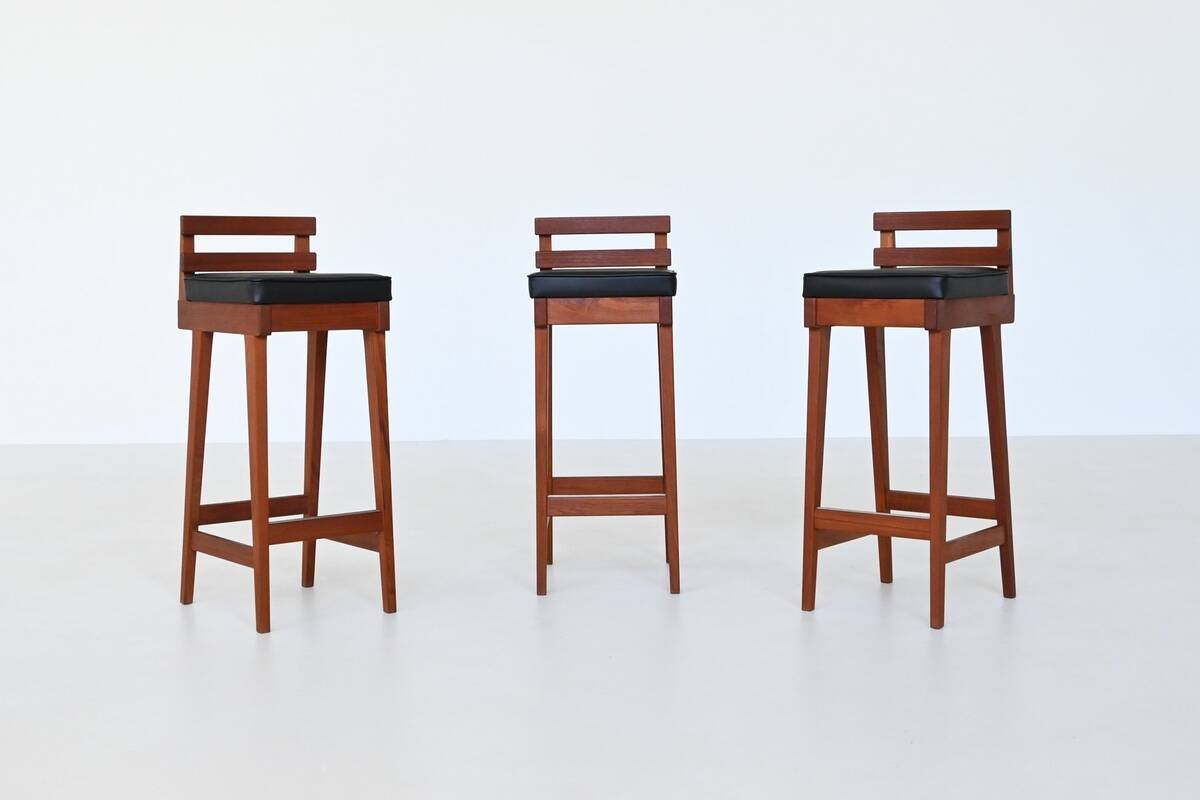 Erik Buck set of three bar stools in teak and leather Dyrlund Denmark 1960