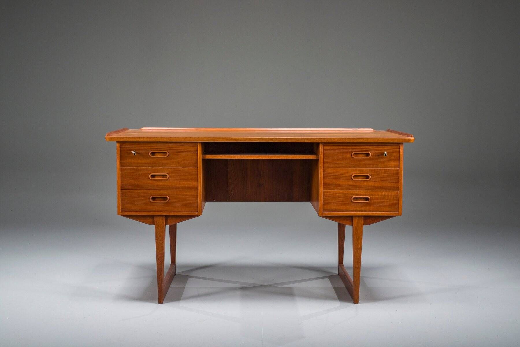 Mid-century Danish freestanding teak desk with raised lip edge, 1960s