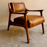 Scandinavian armchair in leather and walnut by Ferdinand 1960