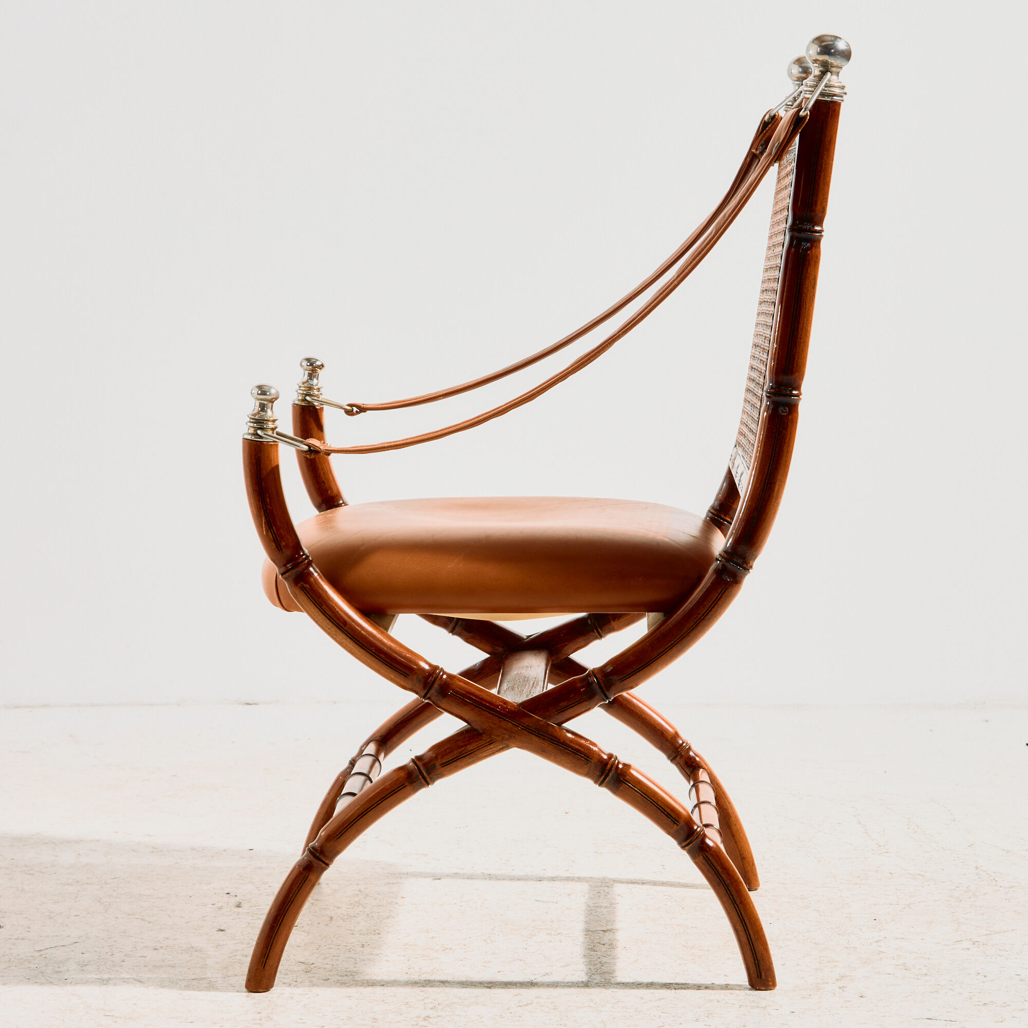 Walnut armchair with bamboo design