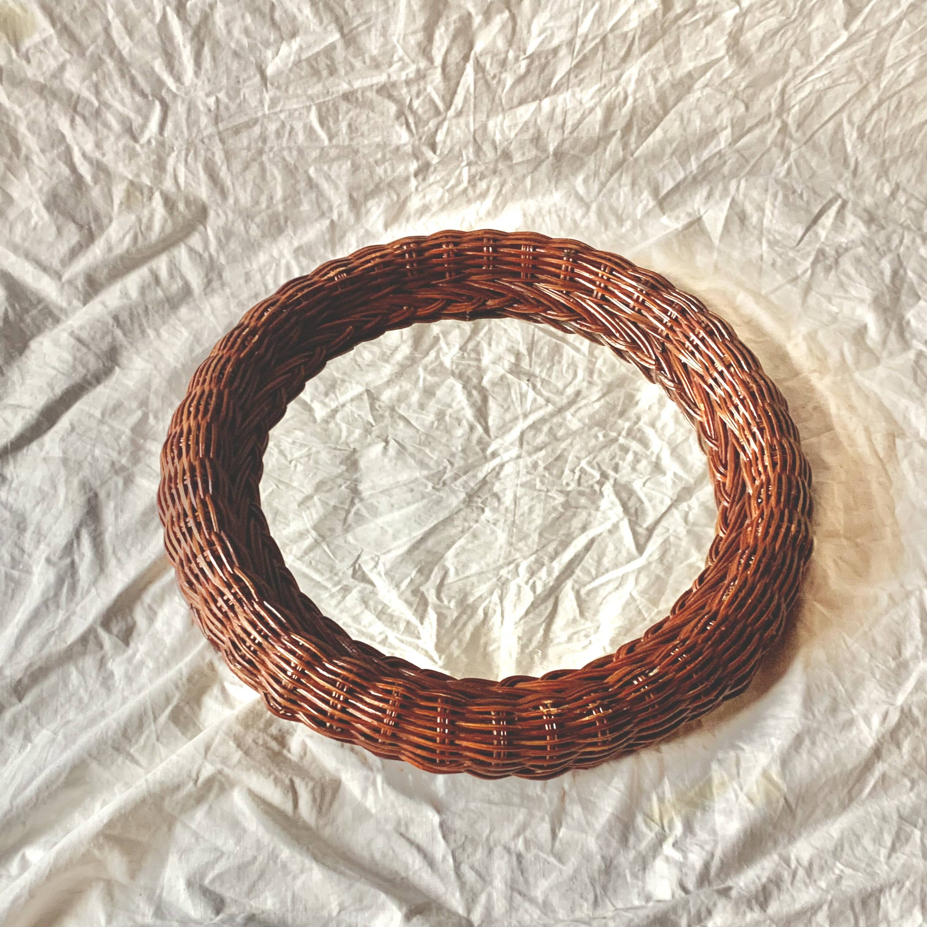 Vintage round woven rattan wall mirror